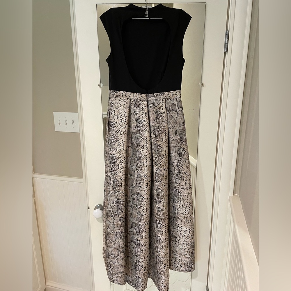 High low evening dress with black high neck top and champagne snakeskin skirt
